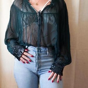 2010s Free People lace up sheer blouse with sequin cuffs
